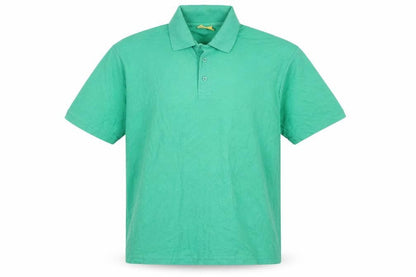 Front view of UCC Collection men’s green cotton polo, size L, collared