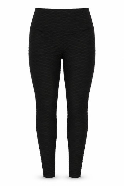 Front view of Preworn women’s black polyester jegging leggings, size L, 26-inch leg