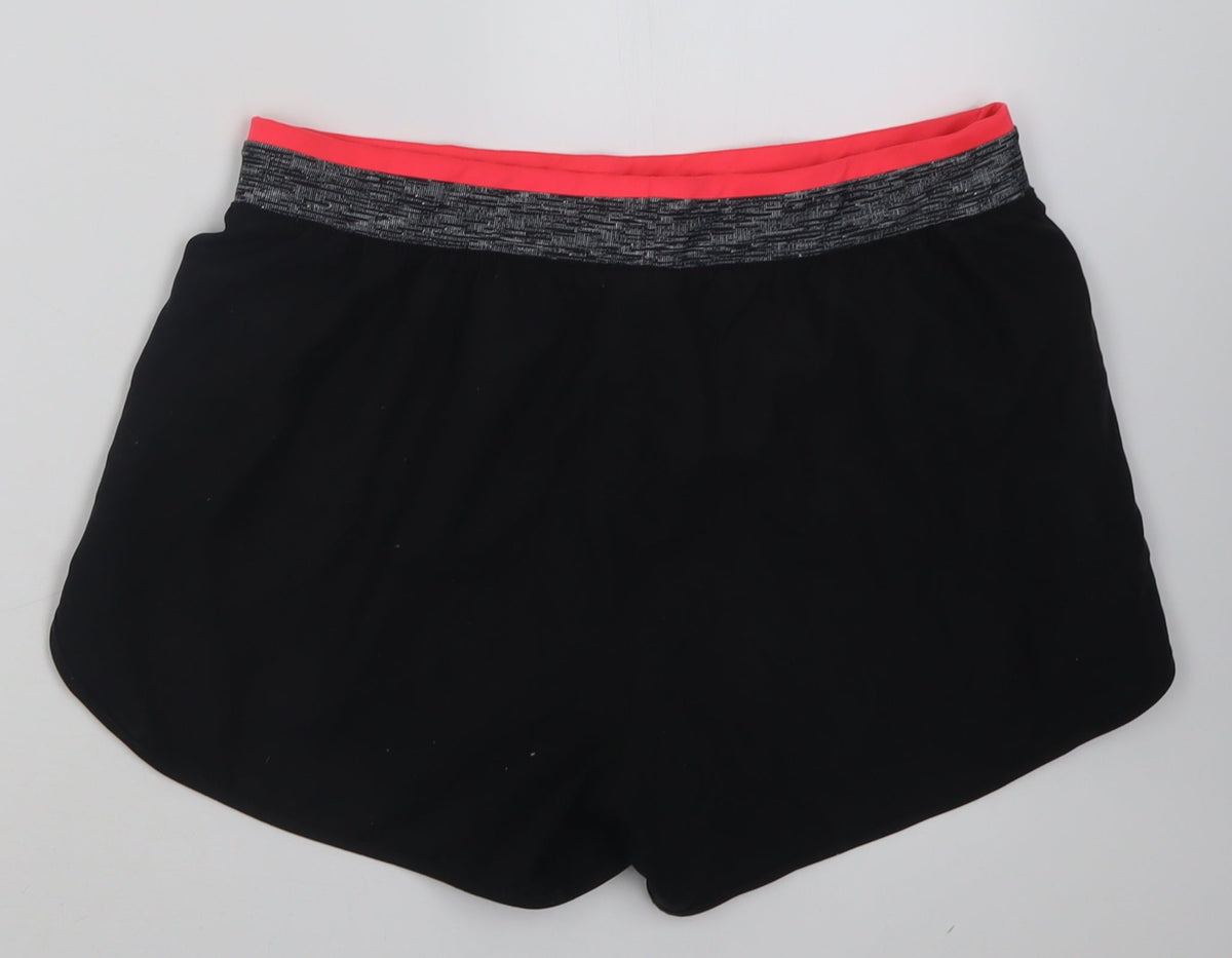 Back view of DECATHLON women’s black polyester sweat shorts, size L, 3-inch leg regular pull on