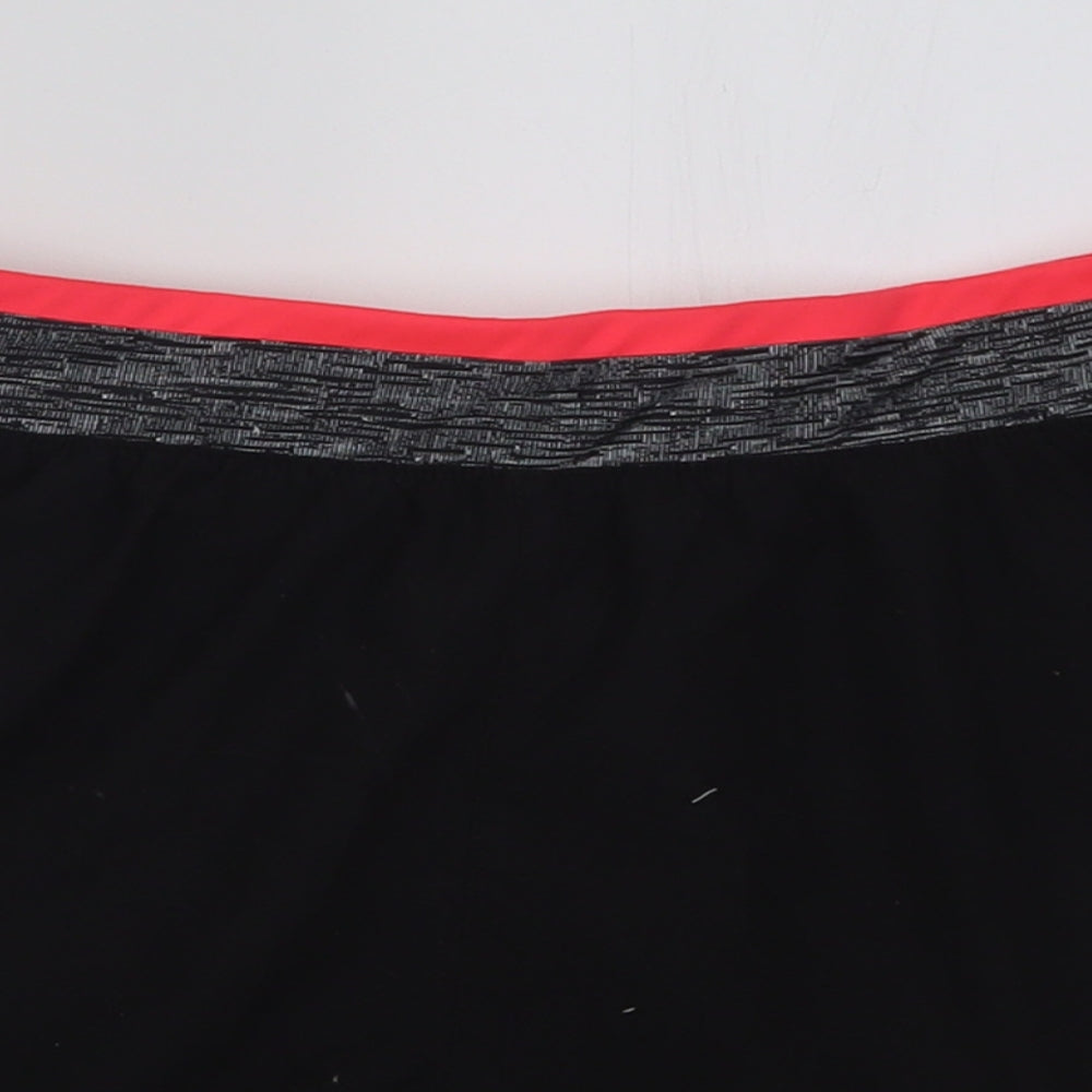Close-up detail of DECATHLON women’s black polyester sweat shorts, size L, 3-inch leg regular pull on