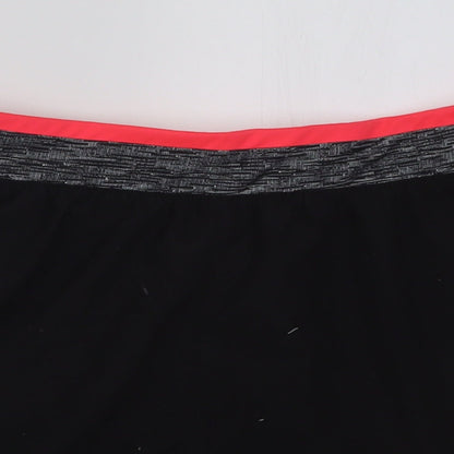 Close-up detail of DECATHLON women’s black polyester sweat shorts, size L, 3-inch leg regular pull on