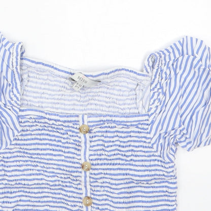 Close-up detail of Evie girls’ blue striped viscose basic blouse, size 9-10, years square neck pullover