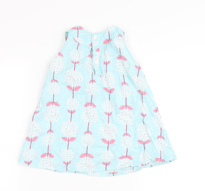 Back view of H&M girls’ blue 100% cotton basic blouse, size 9-12, months round neck pullover