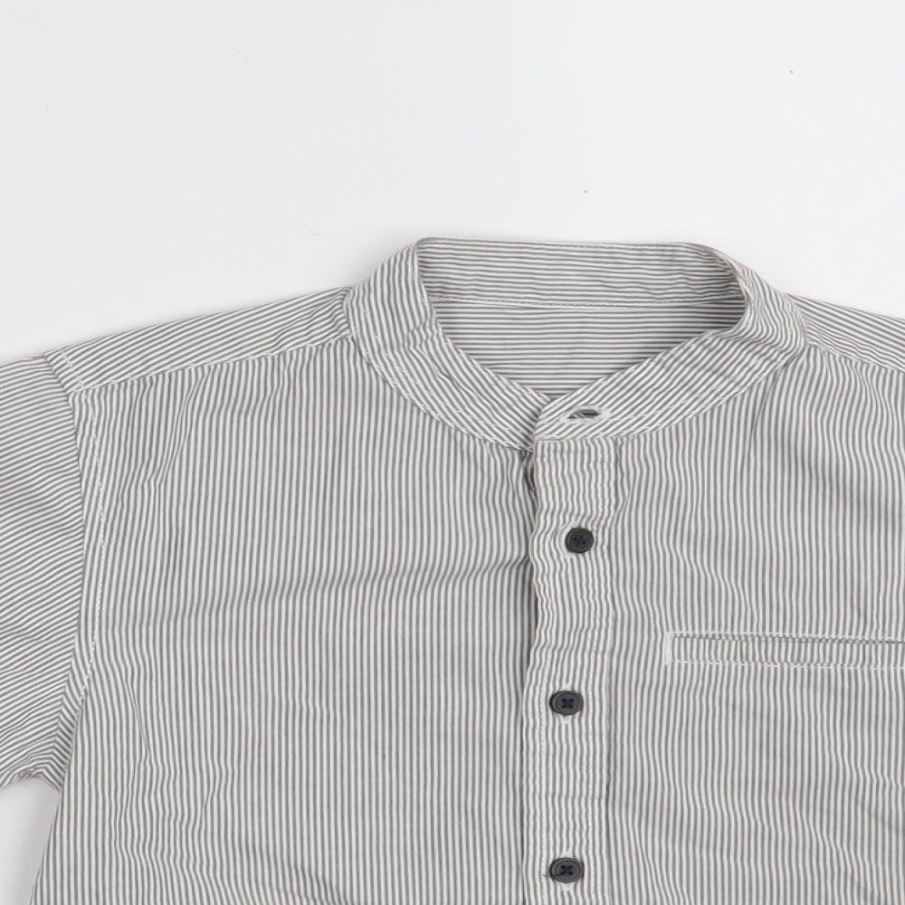 Close-up detail of Dunnes boys’ grey striped 100% cotton basic button-up, size 5, years round neck button