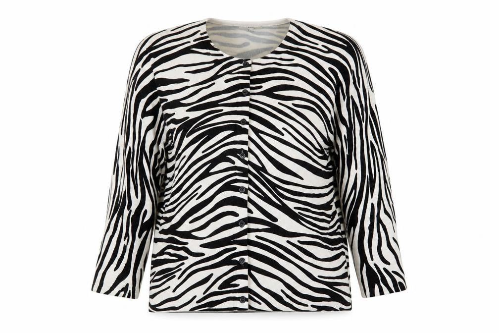 Front view of Country Casuals women’s white scoop neck animal print viscose cardigan jumper, size L