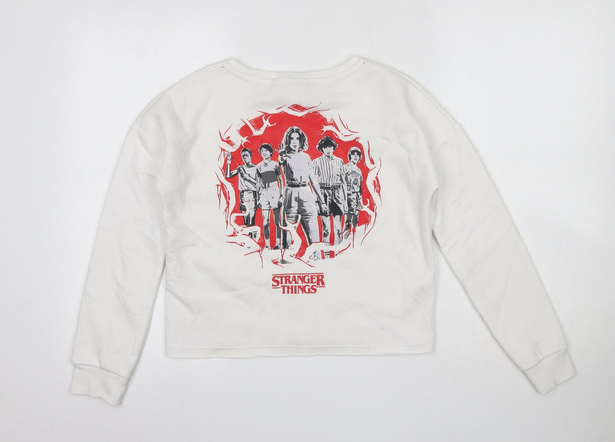 Back view of Stranger Things women’s ivory cotton pullover sweatshirt, size S, - cropped