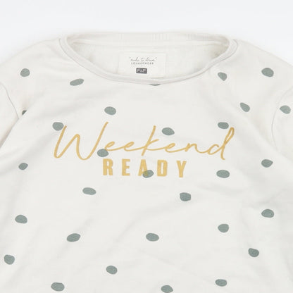 Close-up detail of F&F women’s white polka dot polyester pullover sweatshirt, size S, - weekend ready