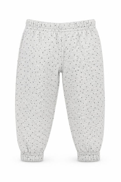 Front view of Primark girls’ grey polka dot cotton jogger trousers, size 9-12, months pullover