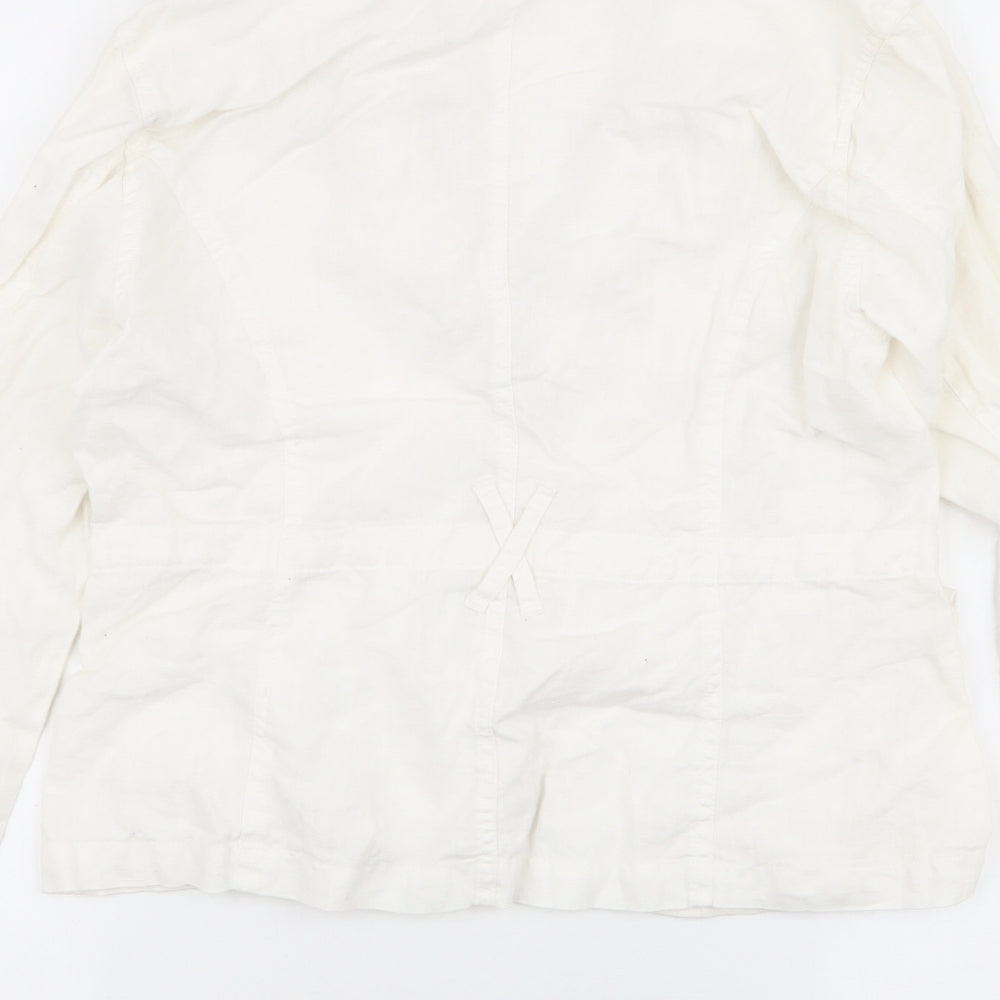 Brand and care label for E Studios women’s ivory jacket, size M, button