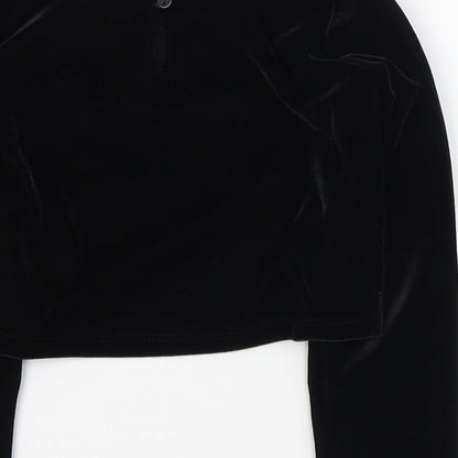 Brand and care label for Dunnes girls’ black polyester basic t-shirt, size 5, years round neck button