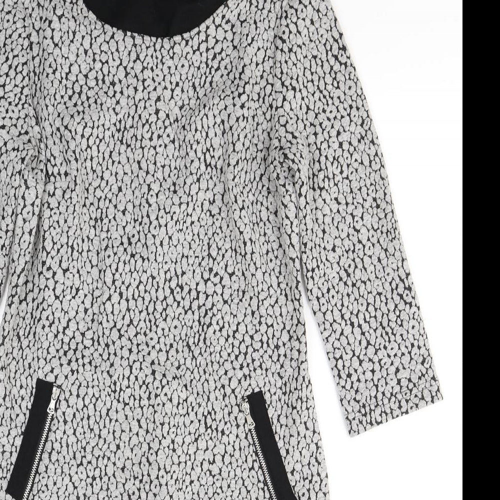 Close-up detail of Taifun women’s green polka dot polyester a-line, size UK 10, round neck pullover