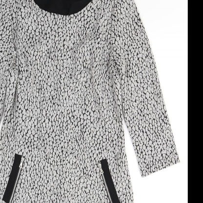 Close-up detail of Taifun women’s green polka dot polyester a-line, size UK 10, round neck pullover