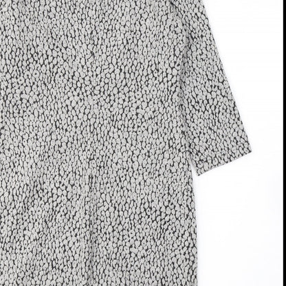 Brand and care label for Taifun women’s green polka dot polyester a-line, size UK 10, round neck pullover