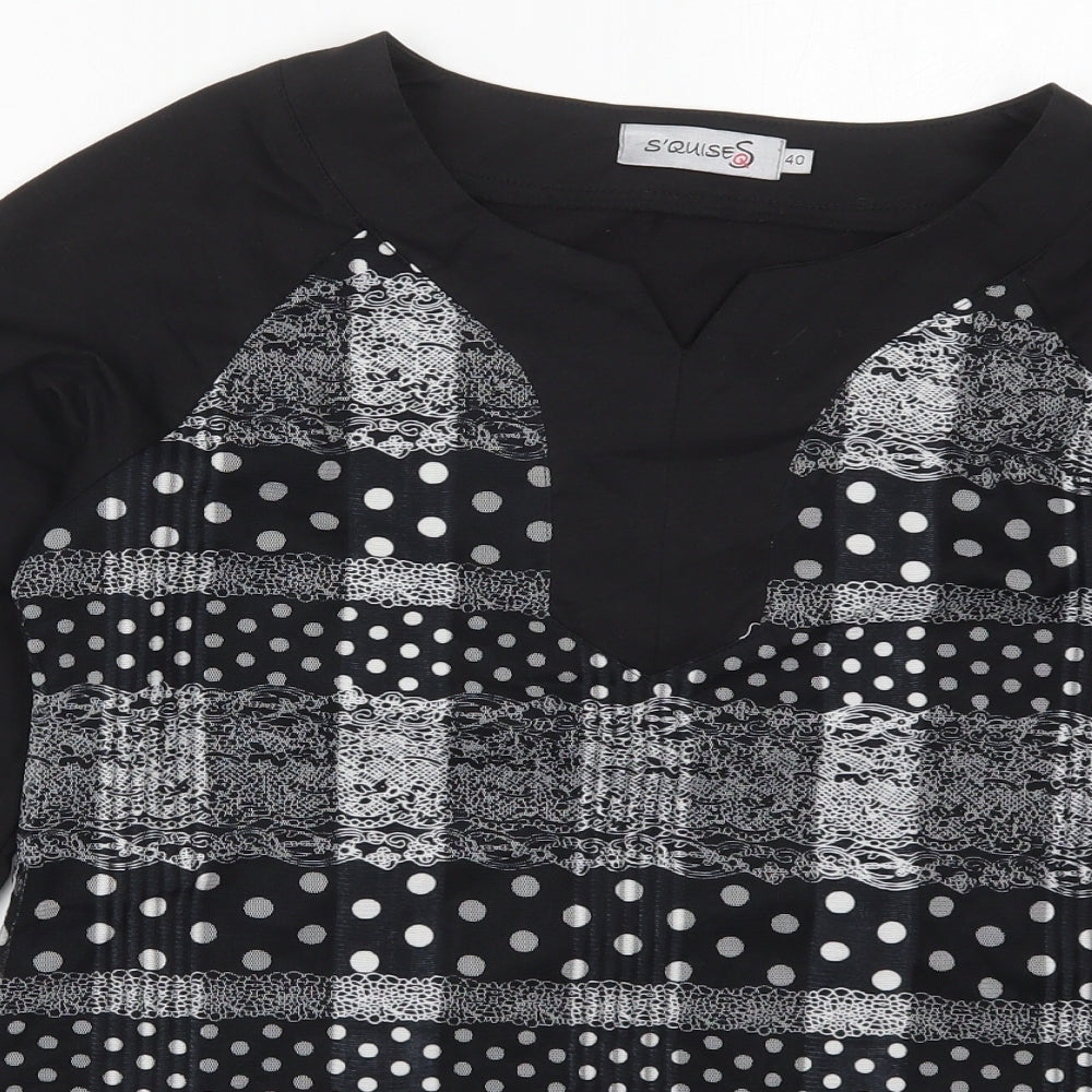 Close-up detail of Squises women’s black polka dot cotton basic t-shirt, size UK 12, v-neck