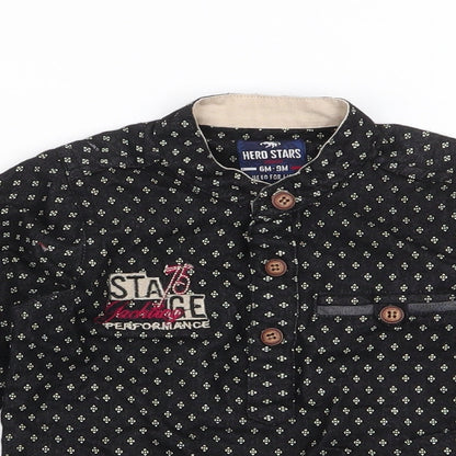 Close-up detail of Hero Stars boys’ black geometric cotton basic button-up, size 6-9, months high neck button
