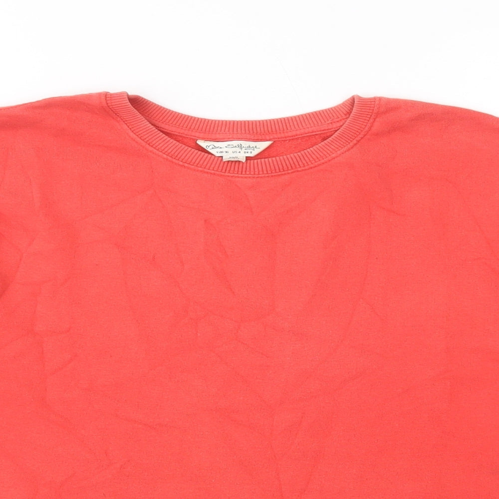 Close-up detail of Miss Selfridge women’s red cotton pullover sweatshirt, size UK 8, pullover