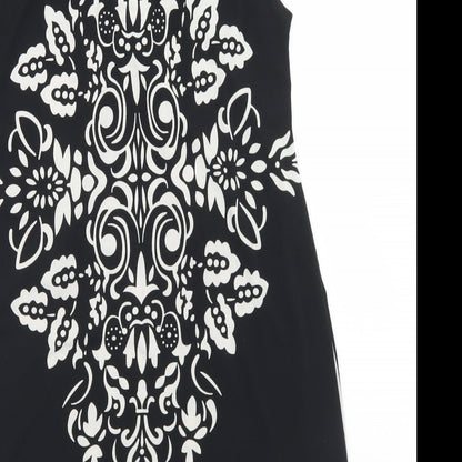Brand and care label for PussyCat women’s black polyester tunic blouse, size S, round neck