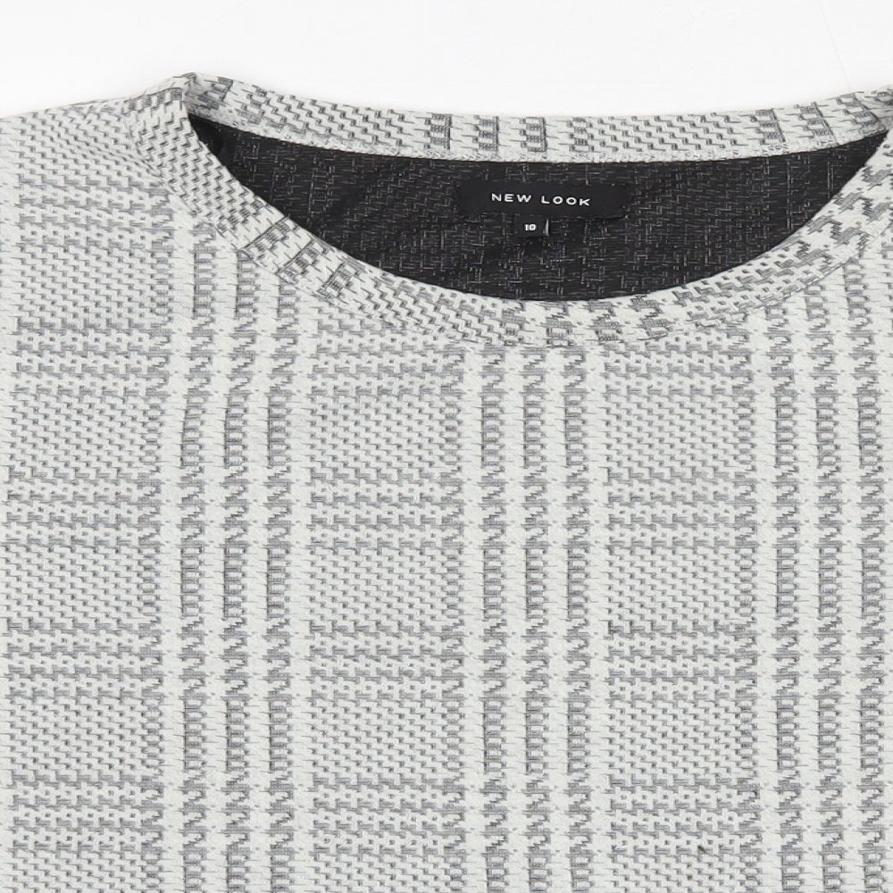 Close-up detail of New Look women’s ivory plaid polyester pullover sweatshirt, size UK 10