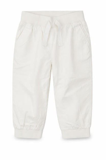 Front view of Next girls’ white cotton chino trousers, size 9, years regular drawstring