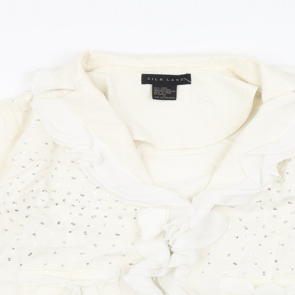 Close-up detail of Silkland women’s ivory jacket, size UK 6, hook & eye