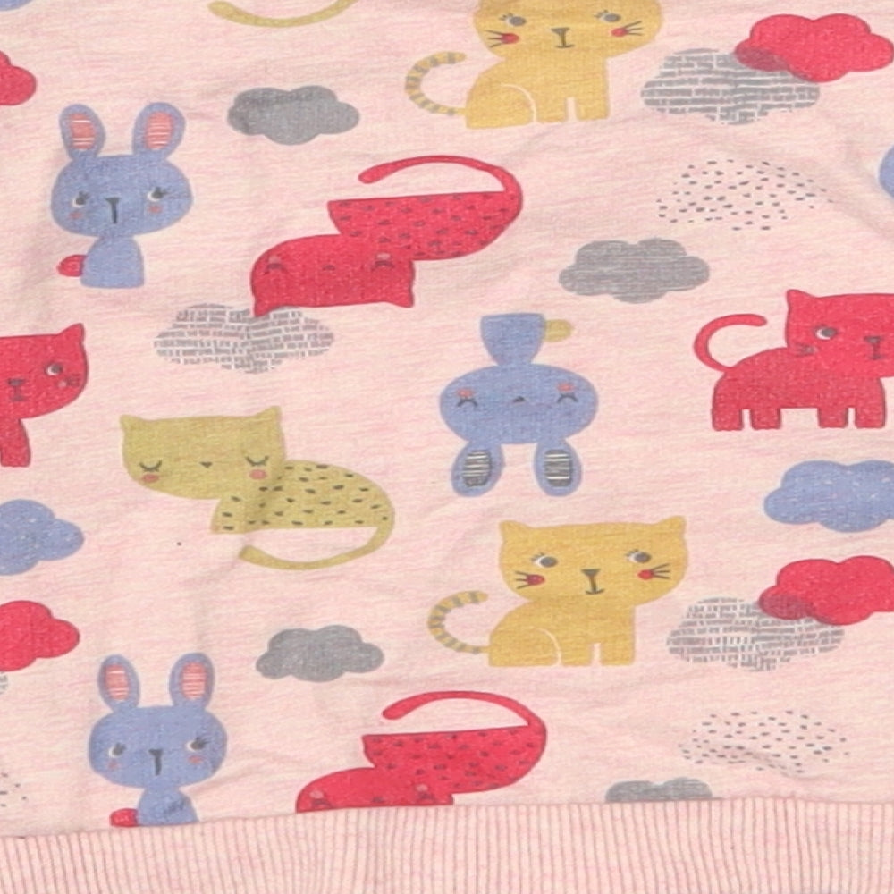 Brand and care label for Nutmeg girls’ pink 100% cotton basic casual, size 6-9, months round neck pullover
