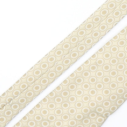 Close-up detail of London Red men’s beige polka dot polyester pointed tie one size
