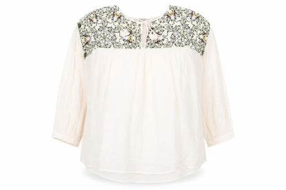 Front view of He Loves Me He Loves Me Not women’s ivory viscose basic blouse, size S, round neck