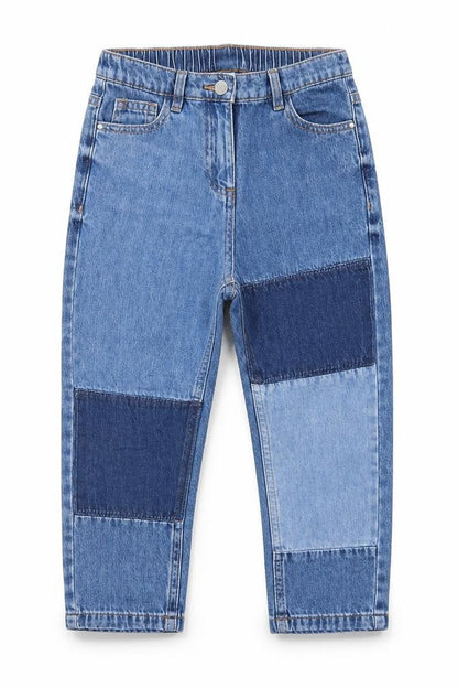 Front view of Next girls’ blue patchwork cotton straight jeans, size 9, months regular button