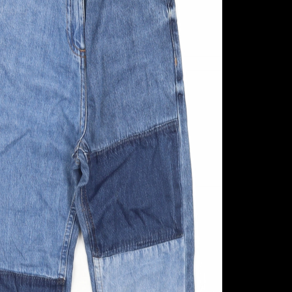 Close-up detail of Next girls’ blue patchwork cotton straight jeans, size 9, months regular button