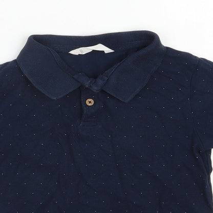 Close-up detail of Mango boys’ blue spotted cotton basic polo, size 6, years collared button