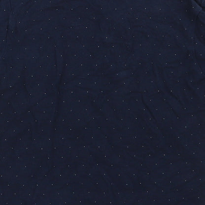 Brand and care label for Mango boys’ blue spotted cotton basic polo, size 6, years collared button