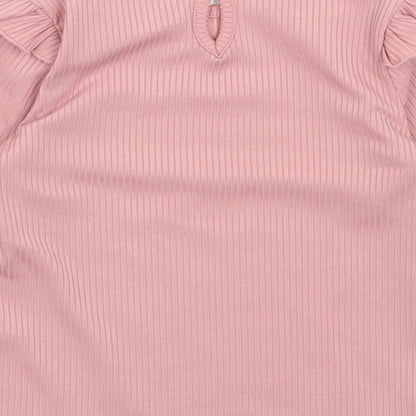 Brand and care label for Primark girls’ pink polyester pullover casual, size 9-12, months round neck pullover
