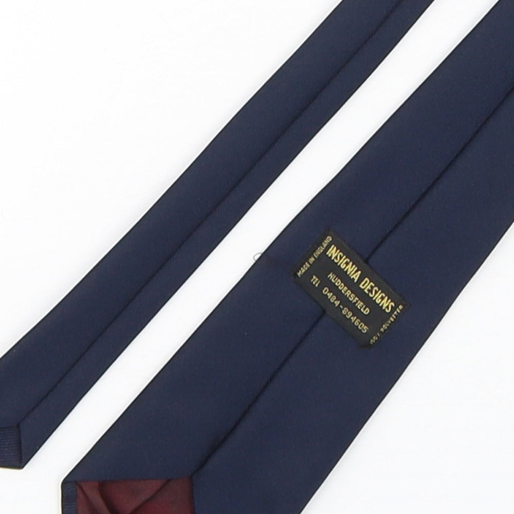 Brand and care label for Insignia Designs men’s blue polyester pointed tie one size