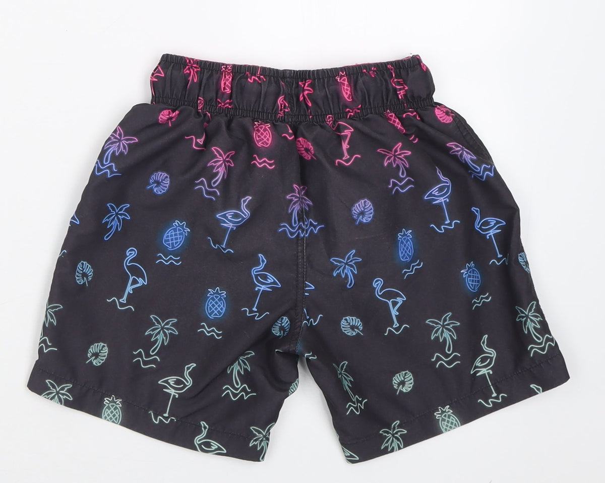 Back view of Primark boys’ black geometric polyester sweat shorts, size 8-9, years regular