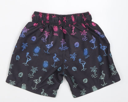 Back view of Primark boys’ black geometric polyester sweat shorts, size 8-9, years regular