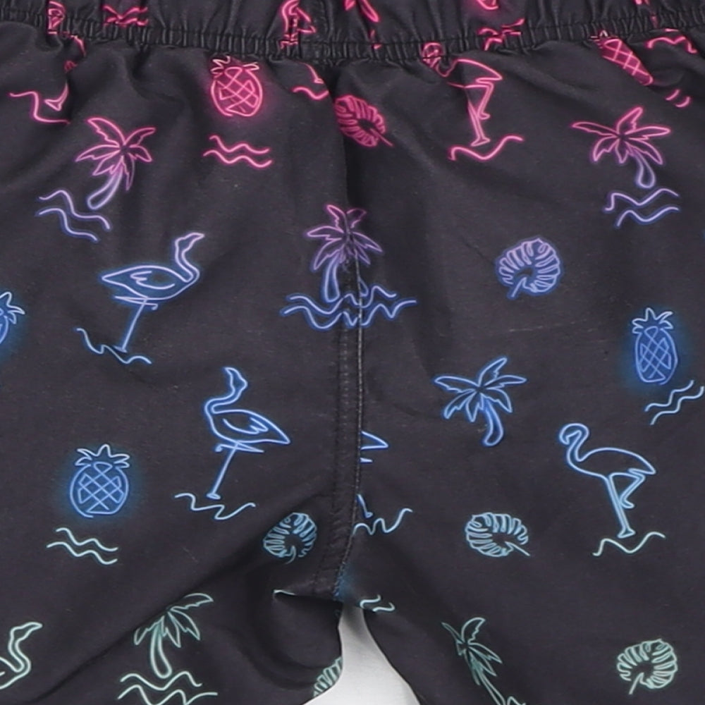 Brand and care label for Primark boys’ black geometric polyester sweat shorts, size 8-9, years regular