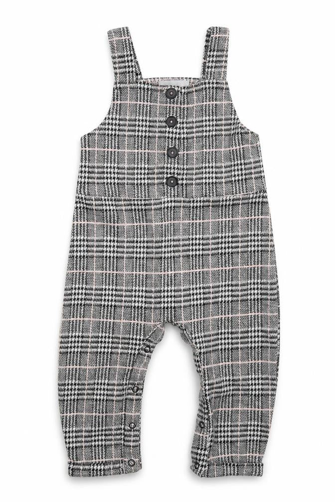 Front view of Primark girls’ grey check polyester pinafore/dungaree dress, size 9-12, months square neck button