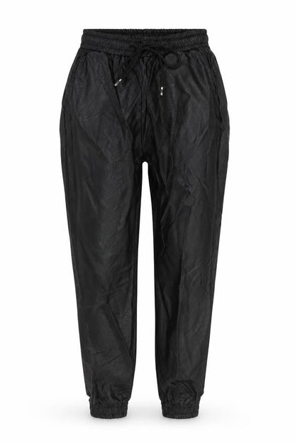 Front view of Made in Italy women’s black polyurethane trousers, size S, 26-inch leg regular tie