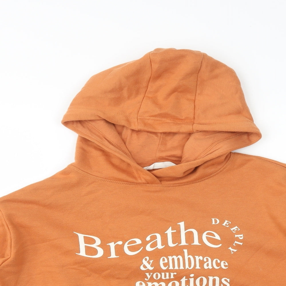 Close-up detail of Primark women’s orange cotton pullover hoodie, size S, pullover - breathe deeply