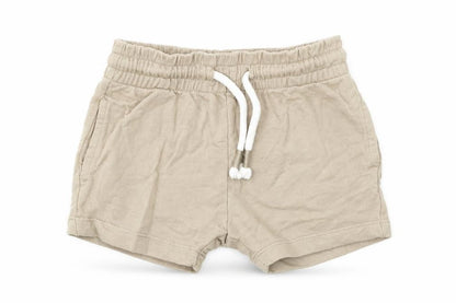 Front view of Next Baby Beige Cotton Cropped Trousers, size 6-9, Months Drawstring