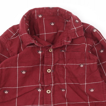 Close-up detail of Dunnes boys’ red check 100% cotton basic casual, size 2-3, years collared button