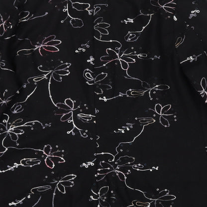 Brand and care label for Exclusive women’s black floral jacket blazer, size M, button