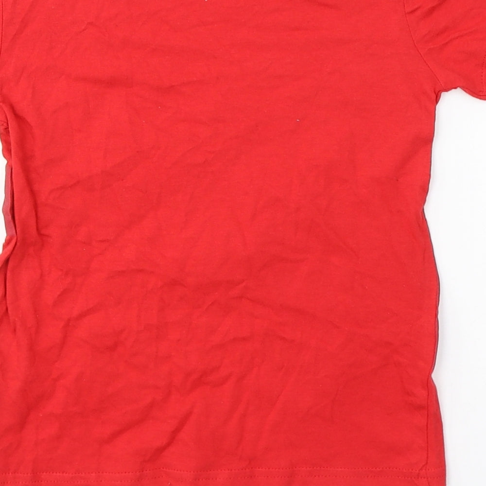 Brand and care label for Dunnes boys’ red cotton basic t-shirt, size 6, years round neck pullover