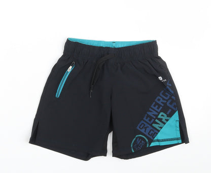 Front view of Domyos boys’ black polyester sweat shorts, size 5, years regular