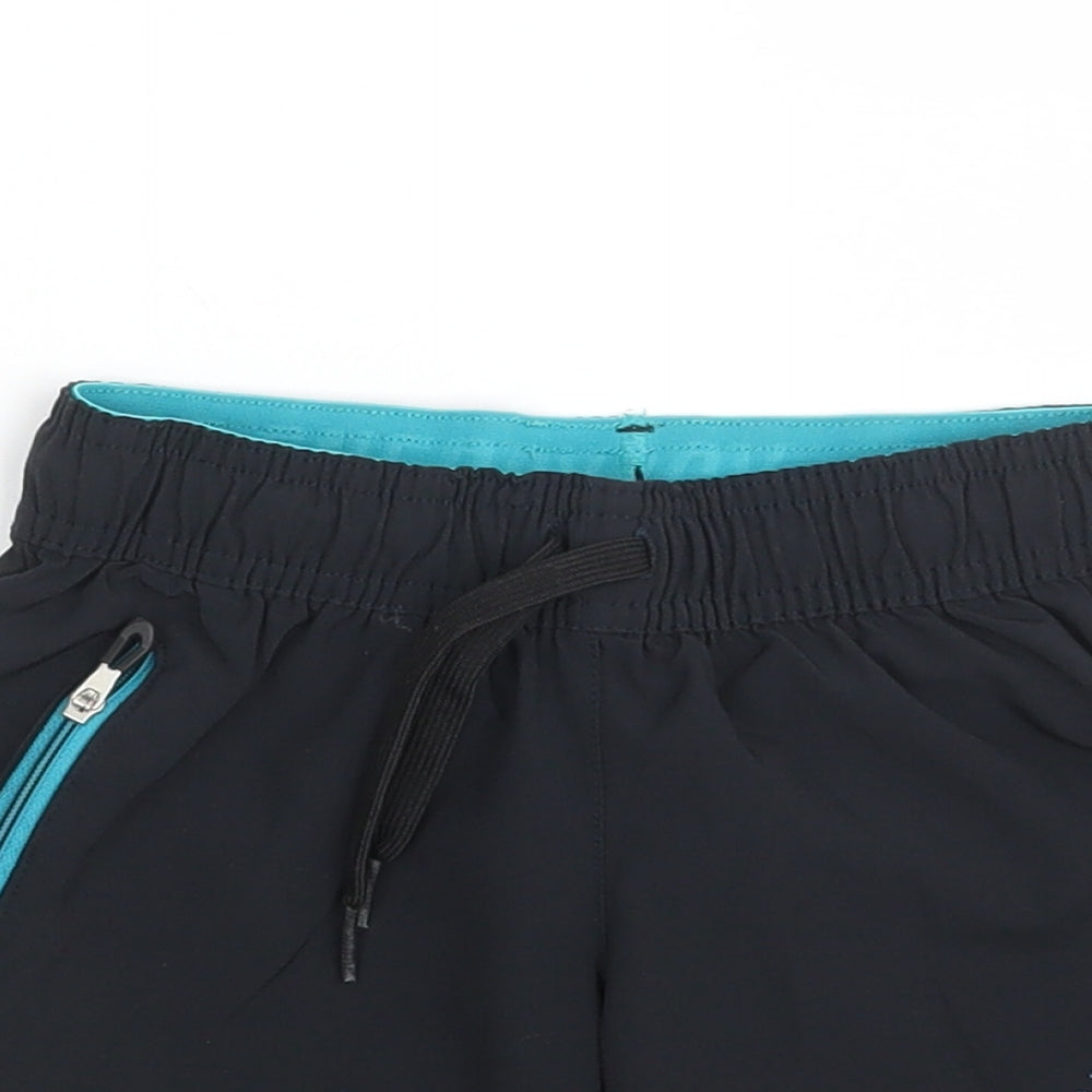Close-up detail of Domyos boys’ black polyester sweat shorts, size 5, years regular