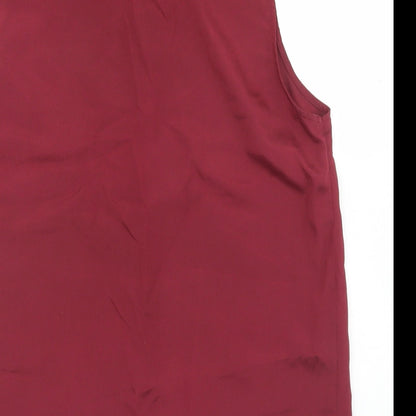 Brand and care label for True Decadence women’s purple polyester basic button-up, size UK 12, collared