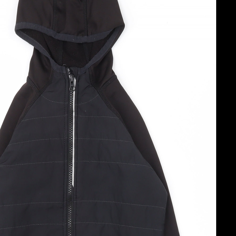Close-up detail of Crane boys’ black jacket coat, size 9-10, years zip