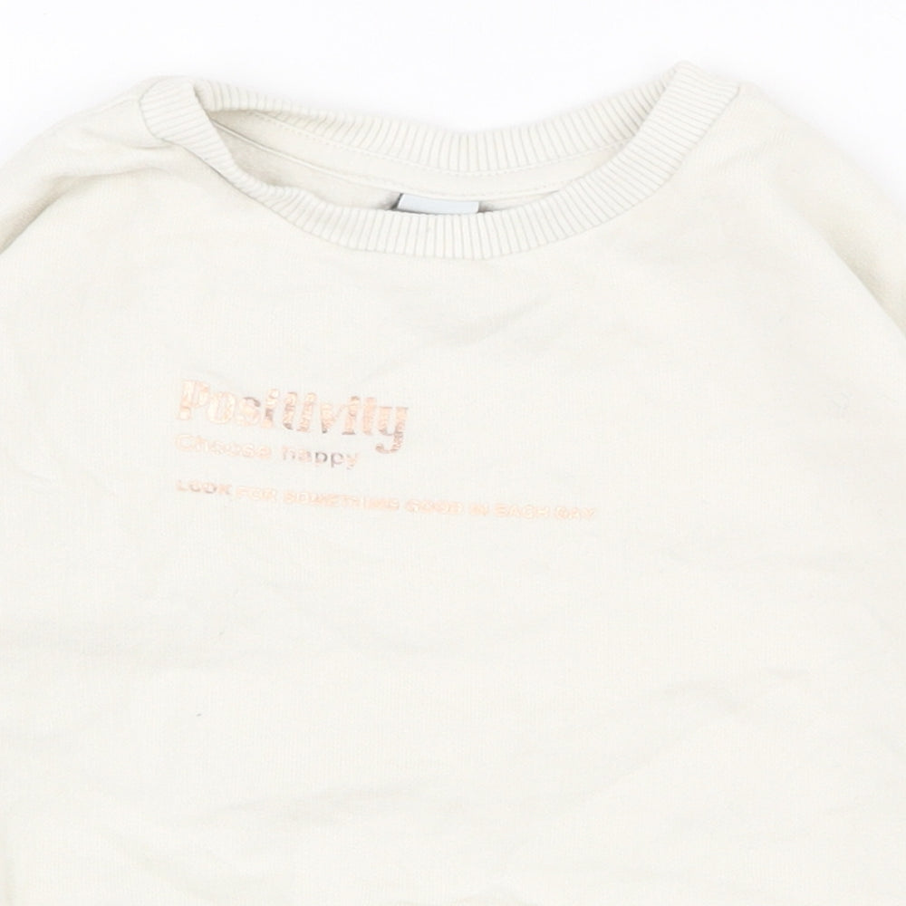 Close-up detail of Tu girls’ white cotton pullover sweatshirt, size 5, years pullover