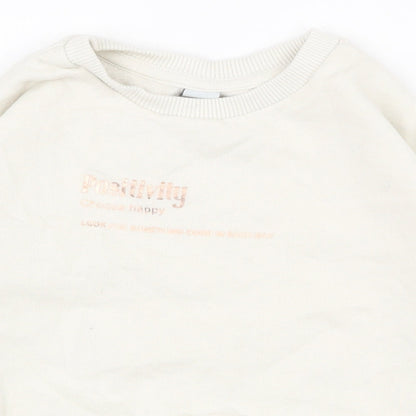 Close-up detail of Tu girls’ white cotton pullover sweatshirt, size 5, years pullover