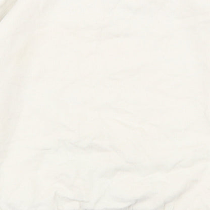 Brand and care label for Tu girls’ white cotton pullover sweatshirt, size 5, years pullover